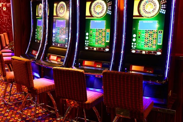 astonbet link Jurassic Kingdom slot game showing 5-reel grid with dinosaur symbols